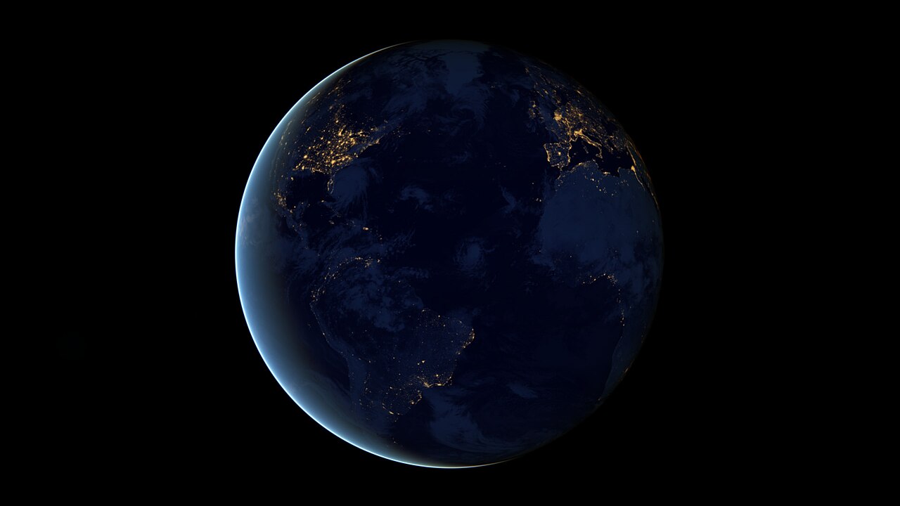 Composite view of Earth at night with city lights visible across Europe, Africa and western Asia, using 2012 Suomi NPP observations.